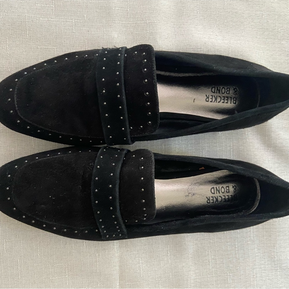Suede black loafers, with metal studs. Very nice comfortable.